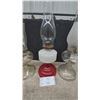 Image 2 : Three Oil Lamps: Clear Glass, Red and White Glass, and Frosted Glass