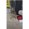 Image 5 : Three Oil Lamps: Clear Glass, Red and White Glass, and Frosted Glass