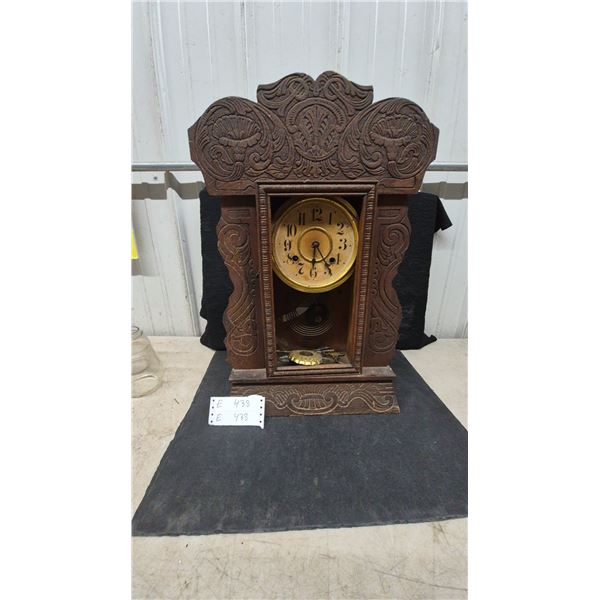 Carved Wood. Gingerbread Mantle Clock with Brass Face and Pendulum, front glass gone