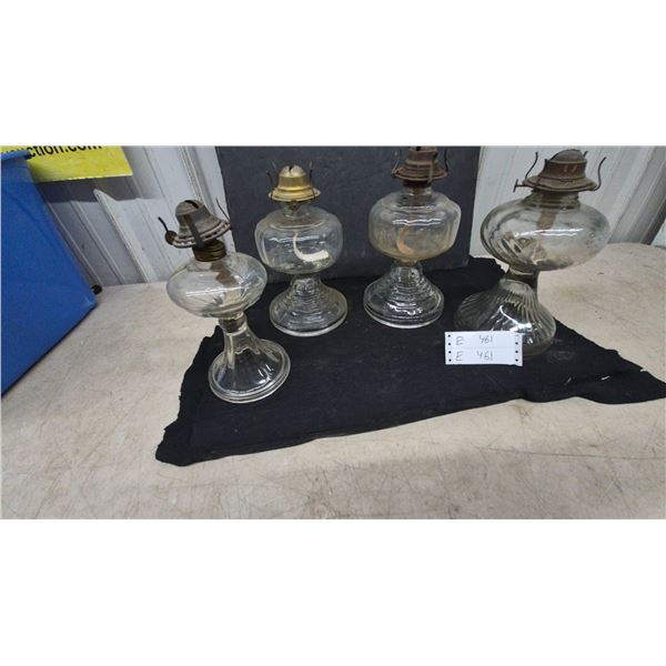 Four Clear Glass Oil Lamps with Metal Burners and Wicks. No chimney