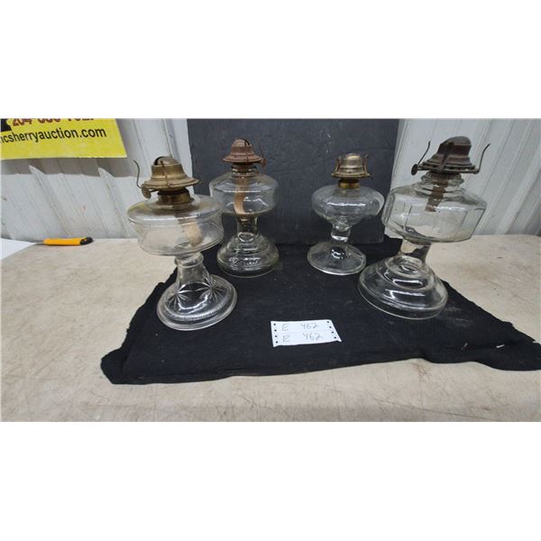 Four Clear Glass Oil Lamps with Metal Burners and Wicks