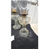Image 3 : 4 Clear Glass Oil Lamps with Chimneys and Brass Burners.