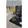 Image 8 : 4 Clear Glass Oil Lamps with Chimneys and Brass Burners.