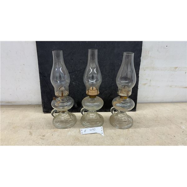 Three Clear Glass Antique Oil Lamps with Finger Handles and Glass Chimneys