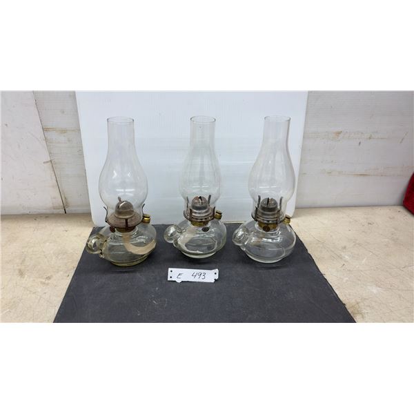 Three Clear Glass Kerosene Oil Finger Lamps with Chimneys and Brass Caps