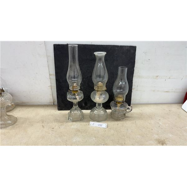Three Clear Glass Kerosene Oil Lamps, Late 19th to Early 20th Century, Pedestal and Finger Styles