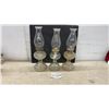 Image 1 : Three Antique Clear Glass Kerosene Oil Lamps With Ribbed Founts and Scroll Pedestal Bases