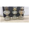 Image 5 : Three Antique Clear Glass Kerosene Oil Lamps With Ribbed Founts and Scroll Pedestal Bases