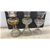 Image 5 : Three Clear Glass Oil Lamps with Pedestal Bases and Chimneys