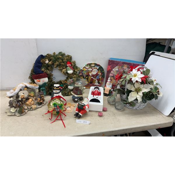 Assorted Christmas Décor Including Wreath, Nativity Scene, Nutcracker, Snowman Candle Holder