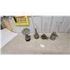 Image 1 : Four Oil Lamps: Wall-Mount Reflector Lamp, Wall-Mount Lamp, Green Base Lamp, and Metal Base Lamp