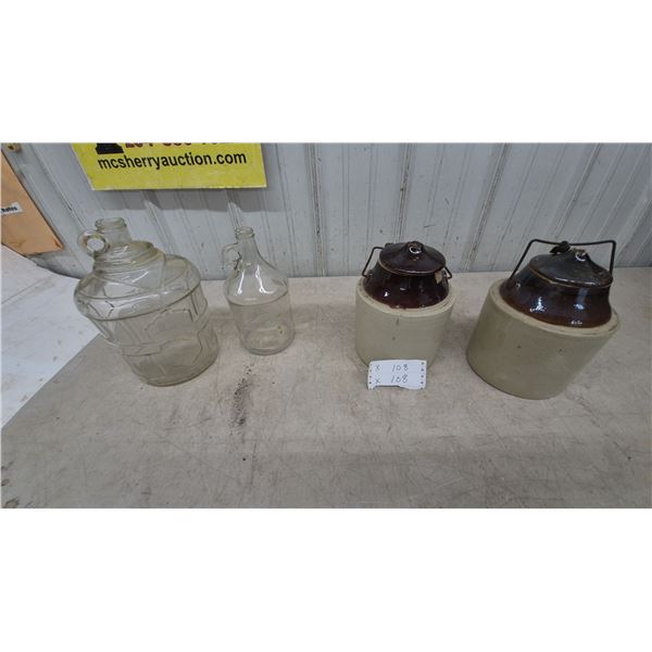 Two Glass Jugs and Two Stoneware pickle Crocks with Lids and Wire Bails