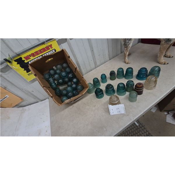 Collection of Glass and Ceramic Insulators, Including Teal, Clear, and Brown Pieces