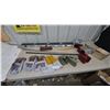 Image 1 : Assorted Levels, Sawhorse Brackets, Work Gloves, Rulers, and Hammer Handle