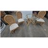 Image 1 : Rattan and Glass Dining Table with Three Rattan Dining Chairs