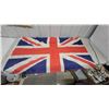 Image 2 : Flags and Warning Sign: Union Jack Flag, Blue White Red Flag, and "Nothing Worth Dying For" Sign