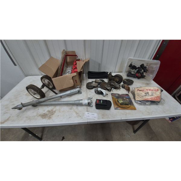 Assorted Casters, Wheels, and Hardware: Incl. 2 Ground Anchors with Wheels, 1 6” Auto Vacuum