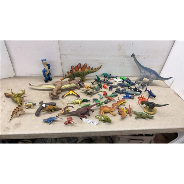 Large Collection of Plastic Dinosaur and Marine Animal Toy Figures with Trees, Rocks