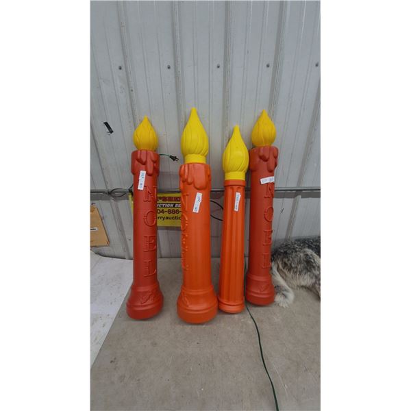 Four Blow Mold Christmas Candles: Two Red "NOEL" and Two Orange Fluted, with Yellow Flames
