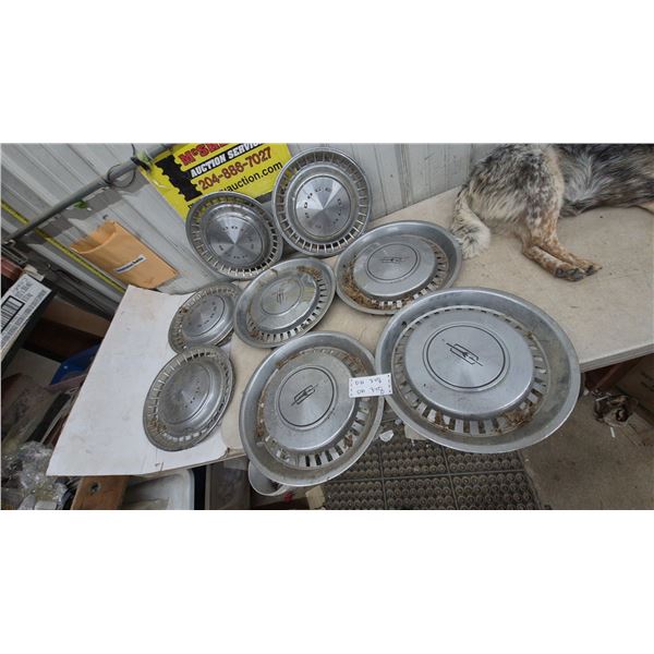 2 Sets of 4 Hubcaps: 1975-1977 Olds Cutlass and 1970s Dodge