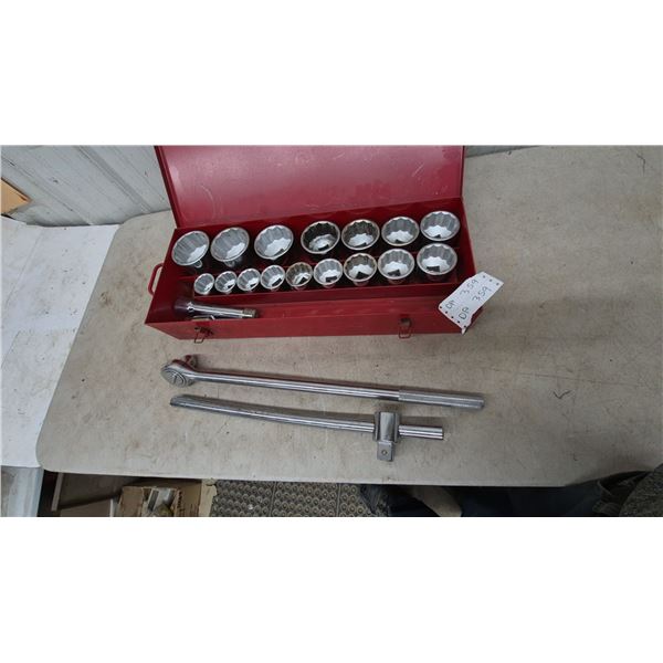 Socket Wrench Set with Ratchet, Breaker Bar, Extension, and Sockets in Metal Case. 1” drive