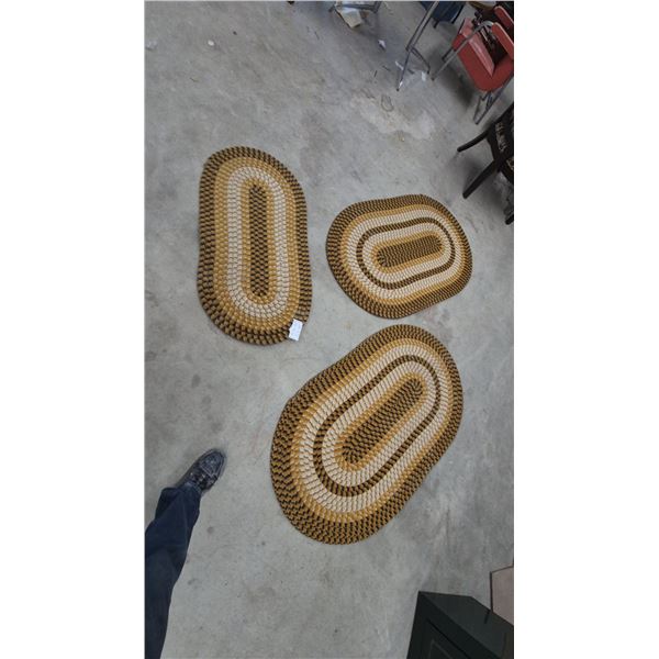 Three Oval Braided Rugs, Tan, Gold, and Black Stripe Pattern