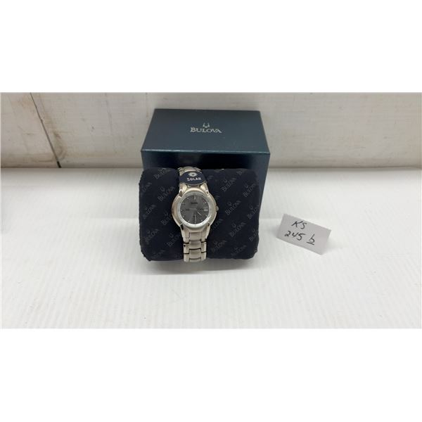 New Bulova Solar Men's Titanium Wristwatch with Silver Dial, Date Display, and Original Box