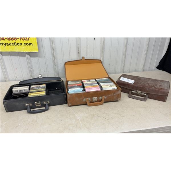 3 Cassette Tape Cases, 1 Empty, 1 full, and 1 Has Some