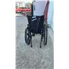 Image 5 : Quickie Manual Wheelchair with Swing-Away Footrests and Seatbelt