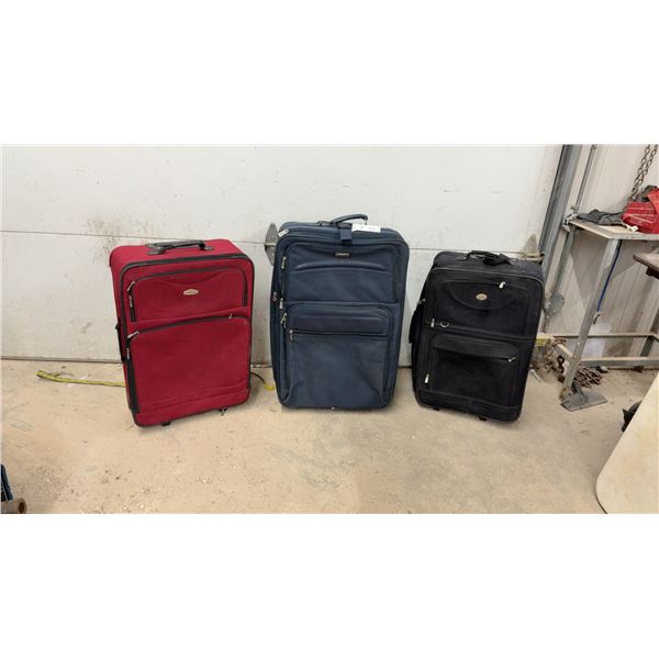 Three Soft-Sided Suitcases with Wheels, Red Cambridge, Blue Tekson, and Black Crown Collection