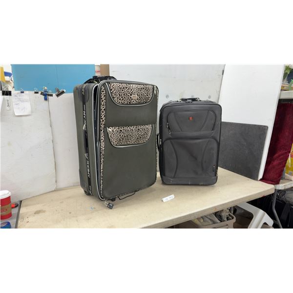 American Tourister Leopard Print Rolling Suitcase and Swiss Gear Black Rolling Suitcase