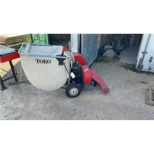 Toro Lawn Vacuum, 5 Horsepower Briggs and Stratton Engine with Collection Bag