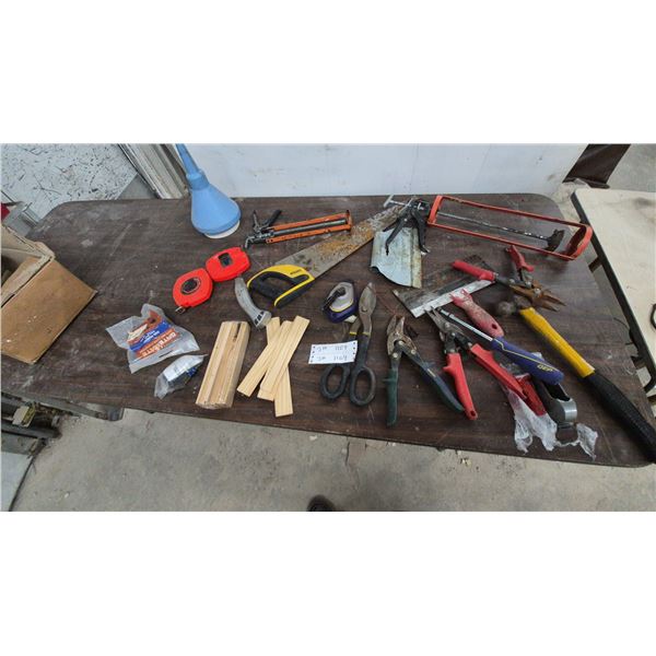 Assorted Hand Tools: Caulk Guns, Hand Saw, and Staple Gun