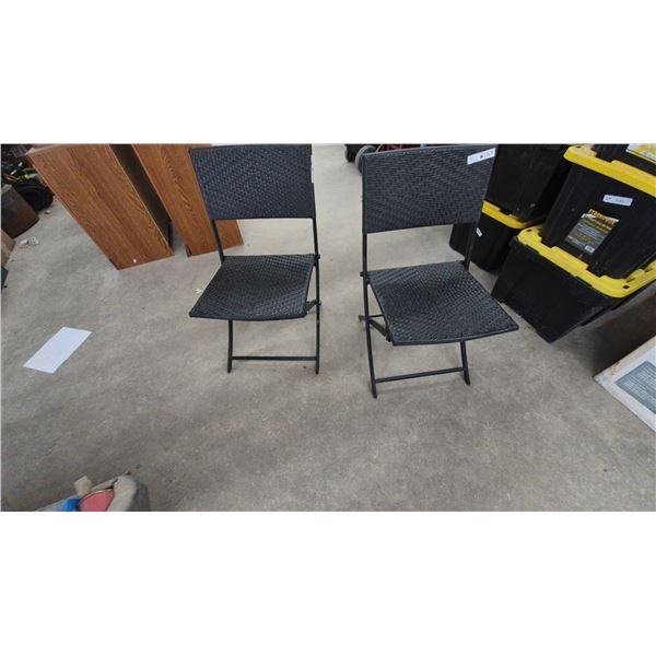 Two Black Woven Folding Chairs