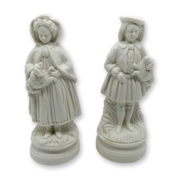 Pair of Bisque Porcelain Figurines