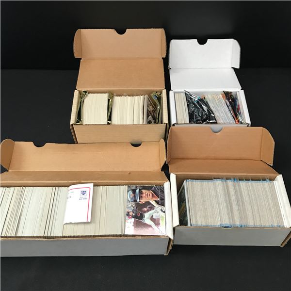 LOT OF 4 BOXES OF SPORTS TRADING CARDS