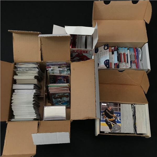 LOT OF 4 BOXES OF SPORTS TRADING CARDS