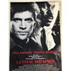 Image 1 : MEL GIBSON AND DANNY GLOVER SIGNED LETHAL WEAPON MOVIE POSTER - WWOC COA