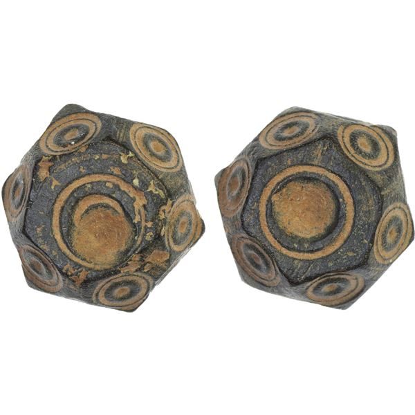 MEDIEVAL ISLAMIC: AE polyhedral weight (14.47g), ca. 8th-12th century, Choice VF