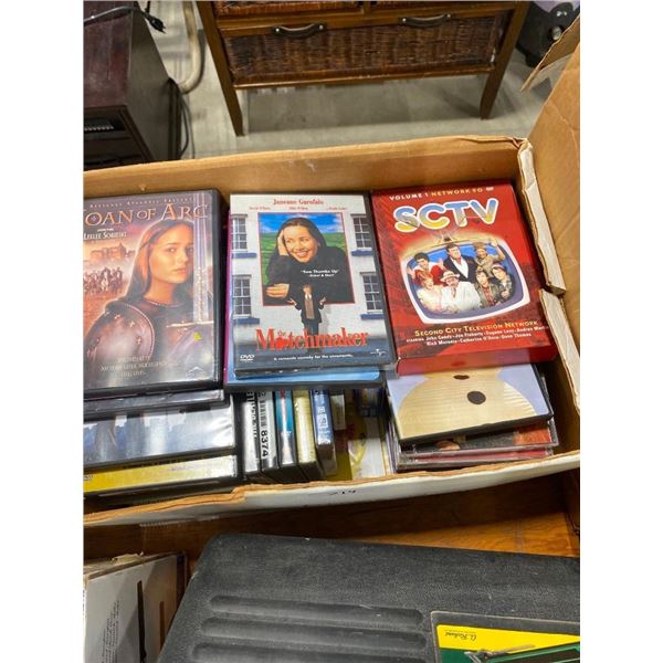 BOX LOT OF ASSORTED DVDS AND CDS