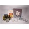 Image 1 : Six empty collectible liquor bottles and a two boxed book set "The Ultimate Book of Whiskey"