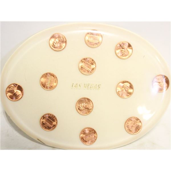 VINTAGE LUCITE TRIVET WITH 1974 PENNIES