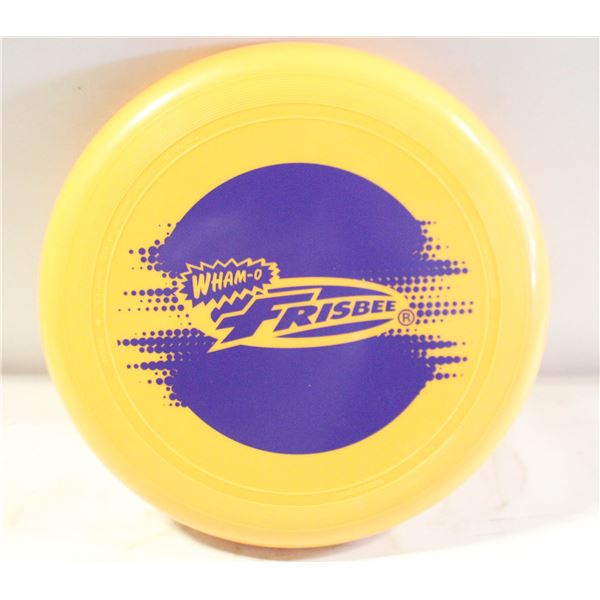 WHAM-O FRISBEE- UNOPENED. YELLOW.