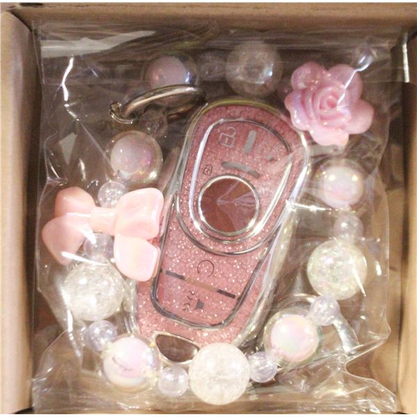 PINK KEY FOB COVER- NEW IN BOX.