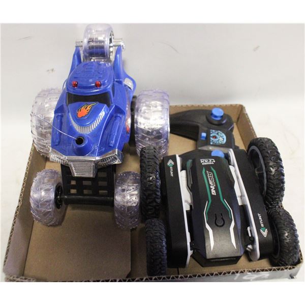 LOT OF 2 RC STUNT CARS 1 REMOTE MISSING