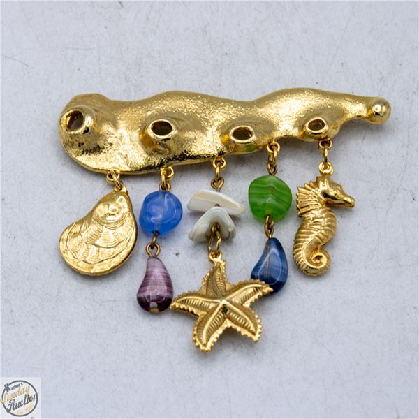 VINTAGE BEACH CHARM GOLD-TONE BROOCH