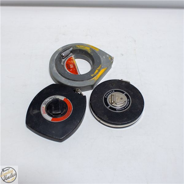 THREE VINTAGE TAPE MEASURES