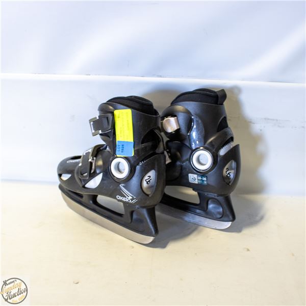 OXELO CHILDRENS SZ 9C/10.5C ICE SKATES - USED