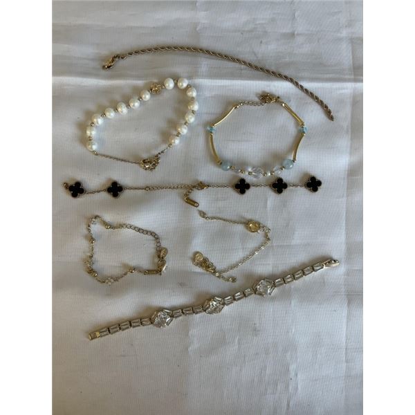 GOLD TONE BRACELETS