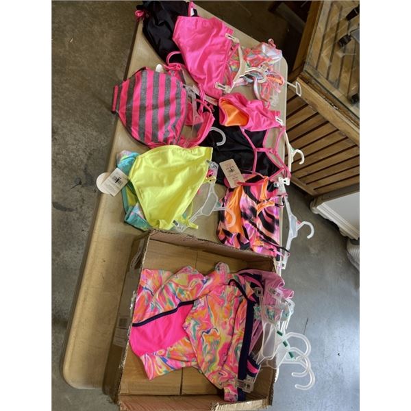 LOT OF NEW GIRLS BATHING SUITS SIZE SMALL, LARGE, AND XL